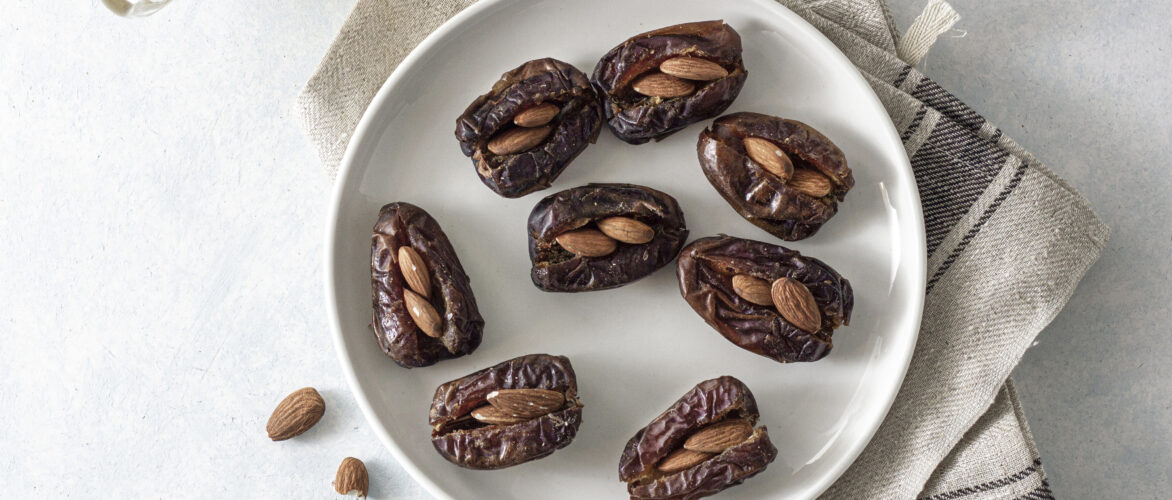 A plate of date stuffed with almonds