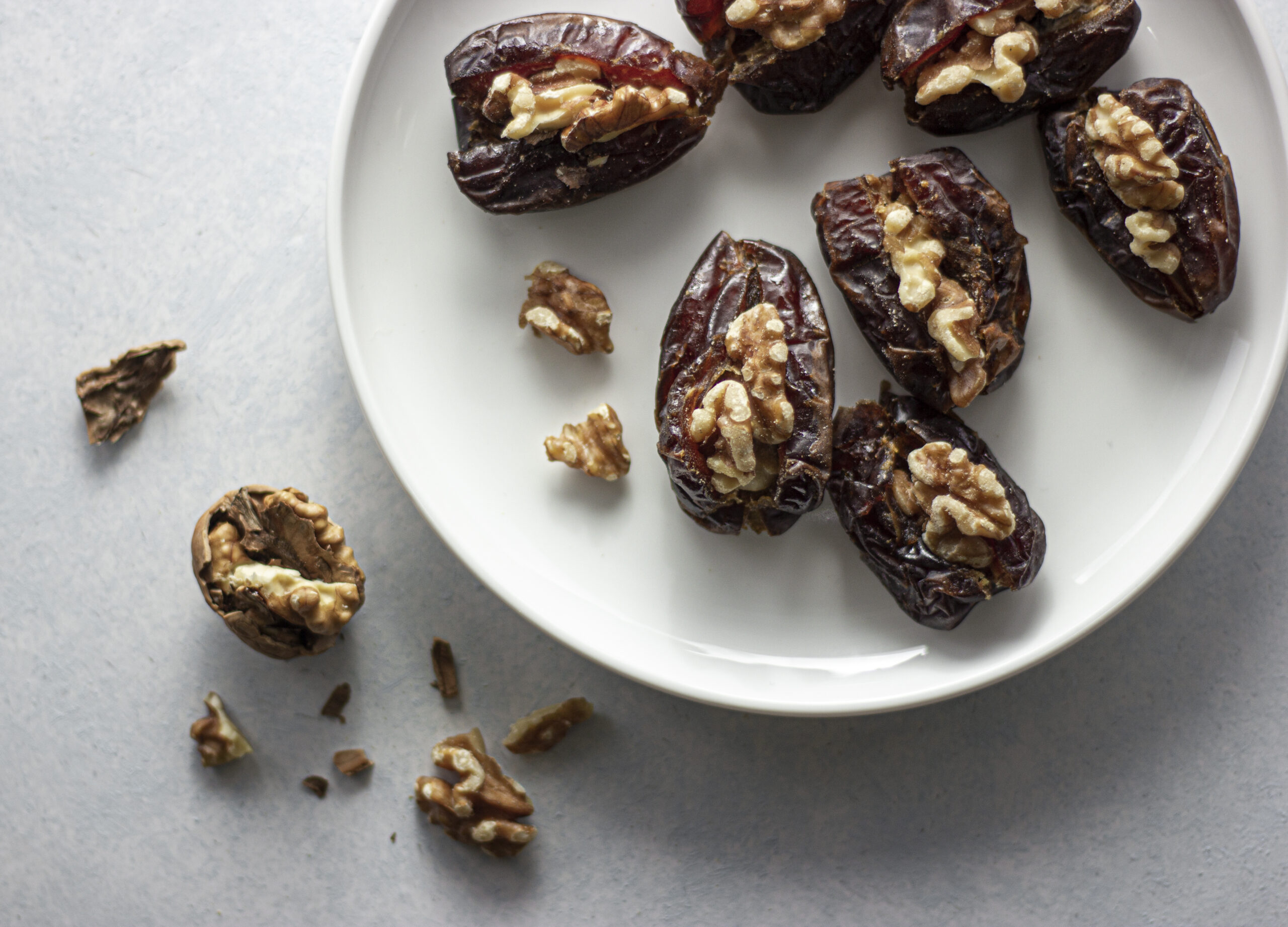 A plate of date stuffed with walnuts